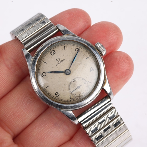 1022 - OMEGA - a Second World War Period stainless steel mechanical wristwatch, ref. 2165, circa 1939, silv... 