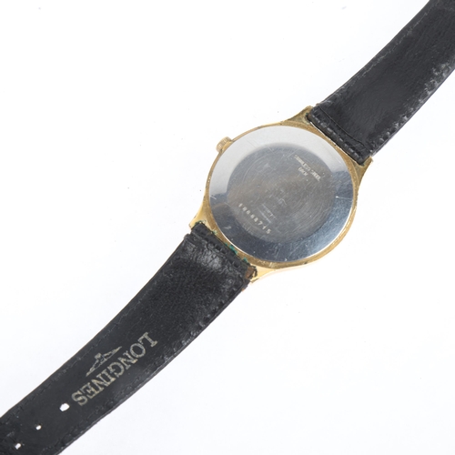 1041 - LONGINES - a gold plated stainless steel mechanical wristwatch, ref. 4427 847, circa 1970s, champagn... 