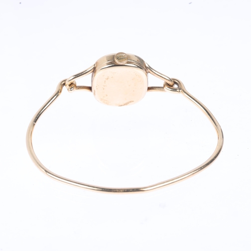 1063 - ROY KING - a lady's Vintage 9ct gold mechanical bangle watch, circa 1970s, champagne dial with quart... 