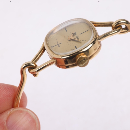 1063 - ROY KING - a lady's Vintage 9ct gold mechanical bangle watch, circa 1970s, champagne dial with quart... 