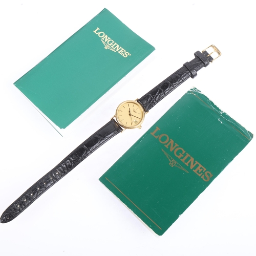 1073 - LONGINES - a lady's gold plated stainless steel Presence quartz calendar wristwatch, ref. L4.136.2, ... 