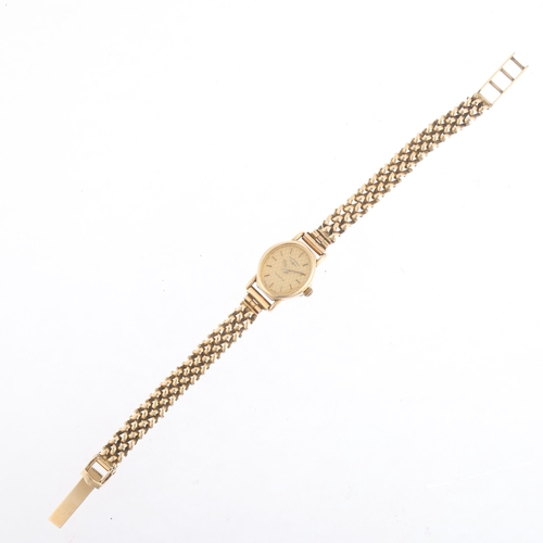 1075 - ROTARY - a lady's 9ct gold quartz bracelet watch, champagne lozenge dial with applied baton hour mar... 