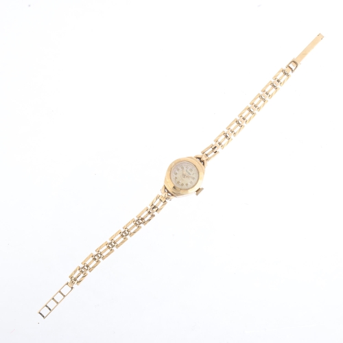 1076 - ROTARY - a lady's Vintage 9ct gold mechanical bracelet watch, silvered dial with applied gilt Arabic... 