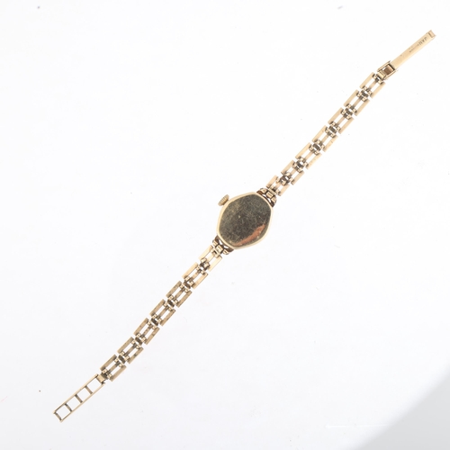 1076 - ROTARY - a lady's Vintage 9ct gold mechanical bracelet watch, silvered dial with applied gilt Arabic... 