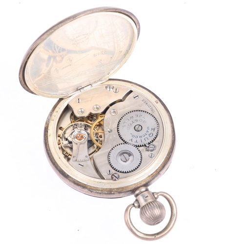 1104 - WALTHAM - a silver open-face keyless pocket watch, black enamel dial with Arabic numerals, cathedral... 