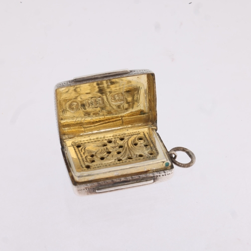 1782 - A Victorian silver vinaigrette, Edward Smith, Birmingham 1861, rectangular form, with bright-cut eng... 