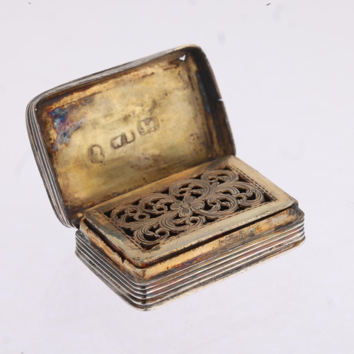 1785 - A George IV silver vinaigrette, William Simpson, Birmingham 1829, rectangular form, with bright-cut ... 