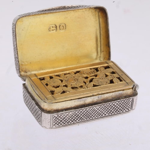 1787 - A George III silver vinaigrette, indistinct maker, London 1809, rectangular form, with allover engra... 