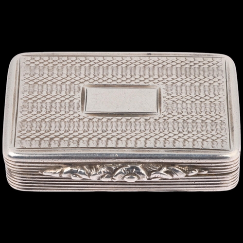 1795 - A George IV silver vinaigrette, maker TS, Birmingham 1830, rectangular form, with engine turned deco... 