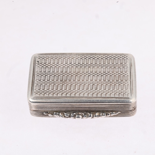 1795 - A George IV silver vinaigrette, maker TS, Birmingham 1830, rectangular form, with engine turned deco... 