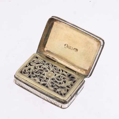 1797 - A George III silver vinaigrette, John Shaw, Birmingham 1820, rectangular form, with engine turned de... 