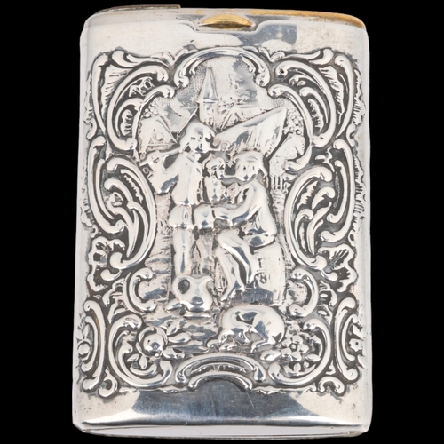 1802 - A Continental silver Vesta case, with relief embossed village decoration and sliding action, 6.5cm x... 