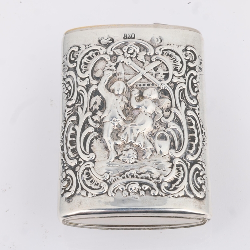 1802 - A Continental silver Vesta case, with relief embossed village decoration and sliding action, 6.5cm x... 