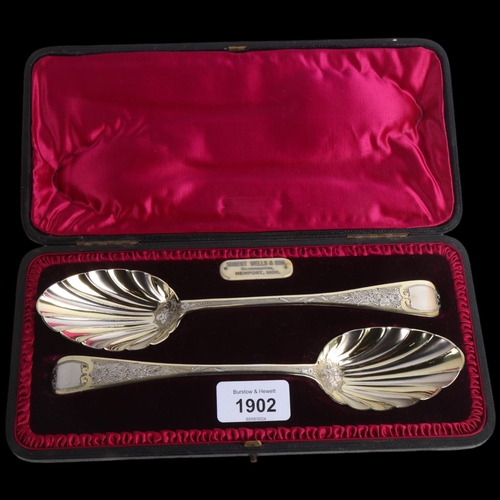 1902 - A cased pair of Victorian silver-gilt Old English pattern shell spoons, Charles Lias, London 1846, 2... 