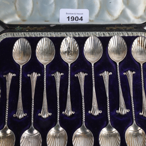 1904 - A cased set of 12 Victorian silver shell teaspoons, Charles Stuart Harris, London 1891, 10cm, 4.2oz ... 