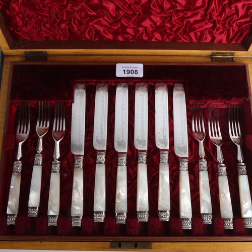 1908 - A cased set of mother-of-pearl handled silver plated dessert cutlery for 6 people, and a set of 6 si... 