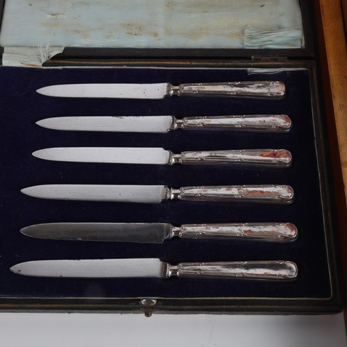 1908 - A cased set of mother-of-pearl handled silver plated dessert cutlery for 6 people, and a set of 6 si... 