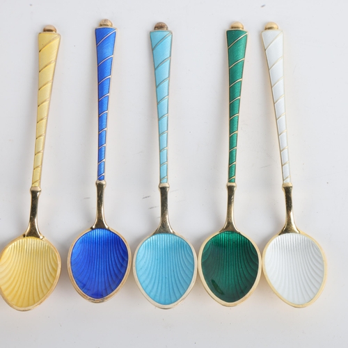 1910 - EGON LAURIDSEN - a set of 6 Danish vermeil sterling silver and harlequin enamel coffee spoons, with ... 