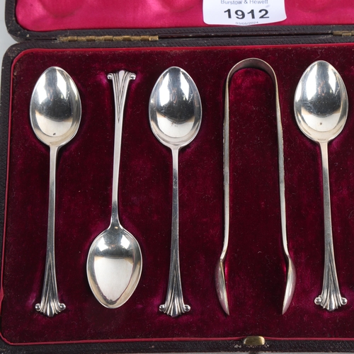 1912 - A cased set of 6 George V silver teaspoons, Sheffield 1933, and a pair of silver plated sugar tongs,... 