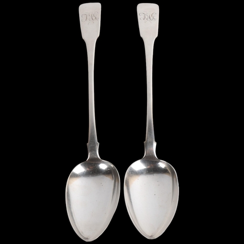 1918 - A pair of George IV silver Fiddle pattern basting spoons, William Woodman, Exeter 1825, 29.5cm, 6.2o... 