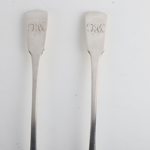 1918 - A pair of George IV silver Fiddle pattern basting spoons, William Woodman, Exeter 1825, 29.5cm, 6.2o... 