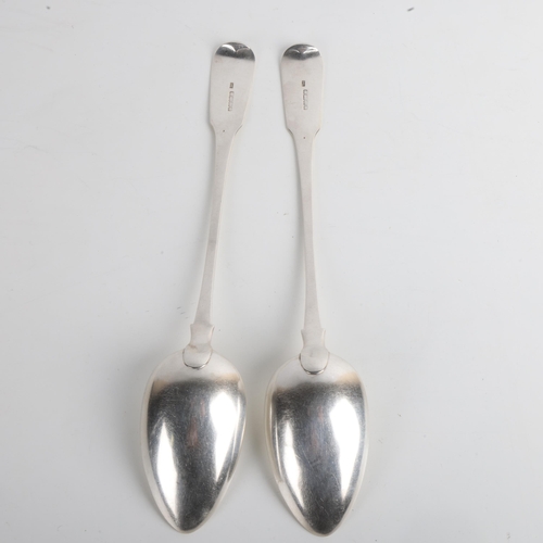 1918 - A pair of George IV silver Fiddle pattern basting spoons, William Woodman, Exeter 1825, 29.5cm, 6.2o... 