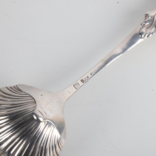 1921 - A George III cast silver shell sauce ladle, Thomas & William Chawner, circa 1760, 18cm, 3.5oz