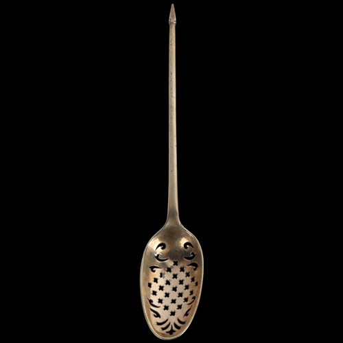 1922 - A George II silver-gilt mote spoon, circa 1750, with cross and foliate pierced bowl and diamond poin... 