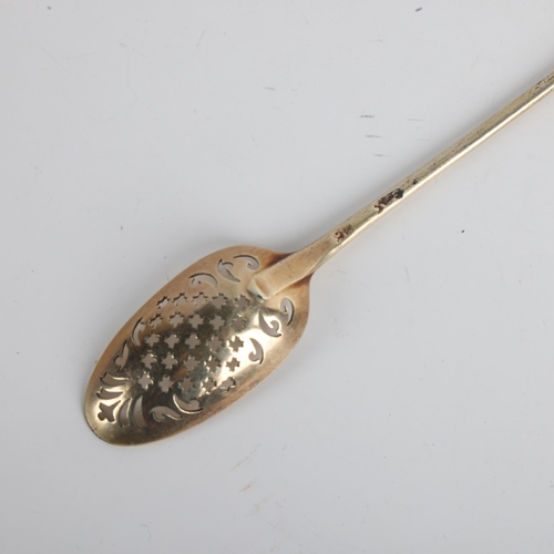 1922 - A George II silver-gilt mote spoon, circa 1750, with cross and foliate pierced bowl and diamond poin... 