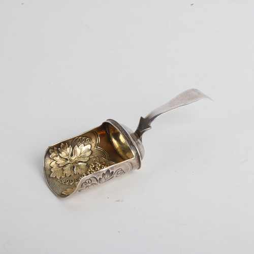 1924 - A George III silver shovel tea caddy spoon, William Lea & Co, Birmingham 1816, relief embossed and g... 