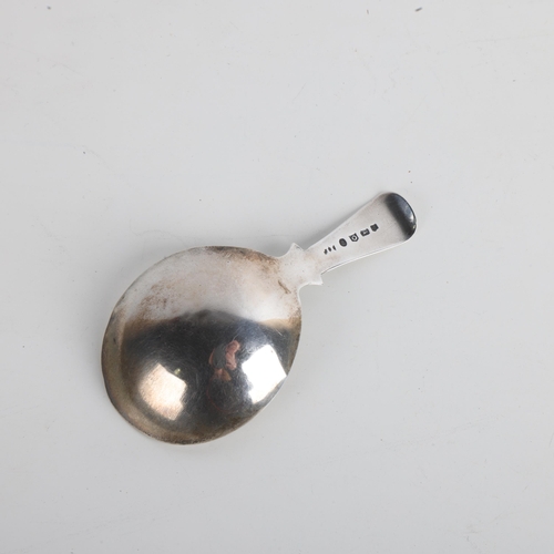 1927 - A George III silver tea caddy spoon, no maker, apparently unmarked, 1812, bright-cut floral engraved... 