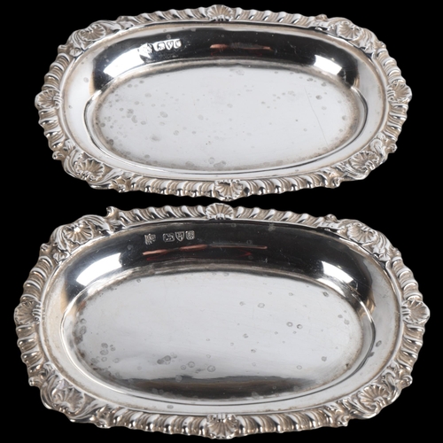 1932 - A pair of Edwardian silver pin dishes, George Nathan & Ridley Hayes, Chester 1902 and 1904, 11cm x 7... 