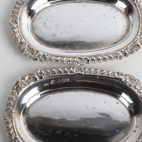 1932 - A pair of Edwardian silver pin dishes, George Nathan & Ridley Hayes, Chester 1902 and 1904, 11cm x 7... 