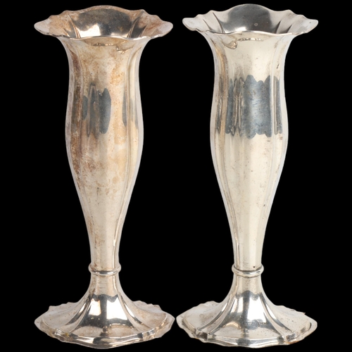 1934 - A pair of Edwardian silver bud vases, Walker & Hall, Chester 1906, weighted bases, 17.5cm