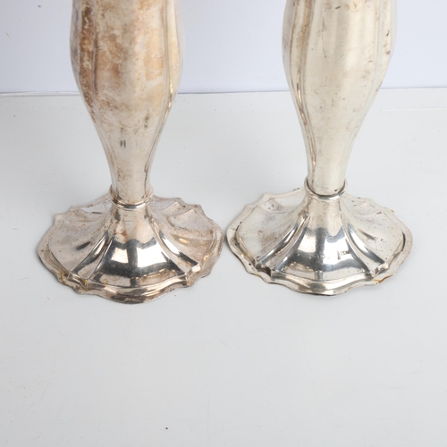 1934 - A pair of Edwardian silver bud vases, Walker & Hall, Chester 1906, weighted bases, 17.5cm