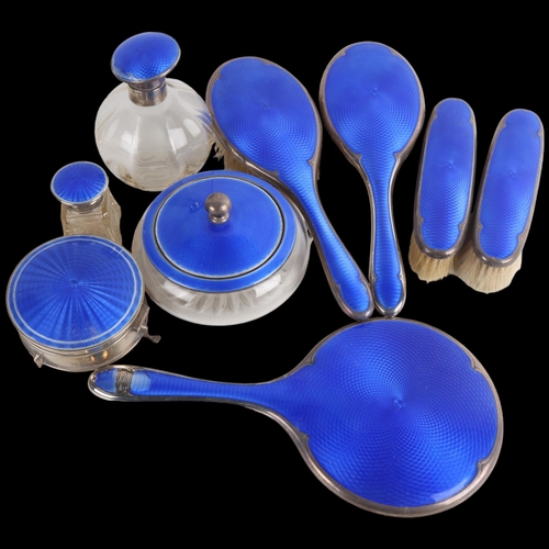 1947 - An Art Deco George V silver and blue enamel 9-piece dressing table vanity set, Walker & Hall, Birmin... 