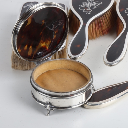 1949 - An Art Deco George V silver and tortoiseshell pique inlaid 8-piece dressing table vanity set, Adie B... 