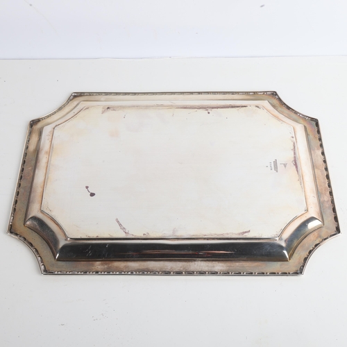 1950 - An Art Deco George V silver dressing table tray, Walker & Hall, Sheffield 1923, shaped rectangular f... 