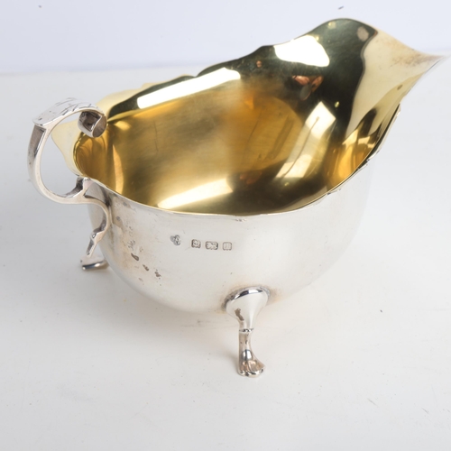 1953 - A George V silver sauce boat, Horace Woodward & Co Ltd, Birmingham 1910, C-shaped acanthus leaf hand... 