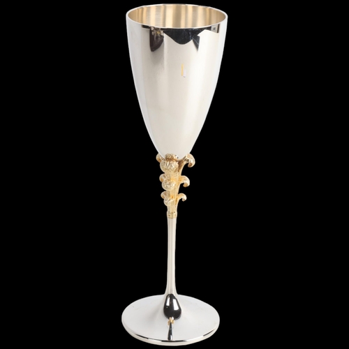 1957 - STUART DEVLIN - an Elizabeth II parcel-gilt commemorative Prince of Wales champagne flute, London 19... 