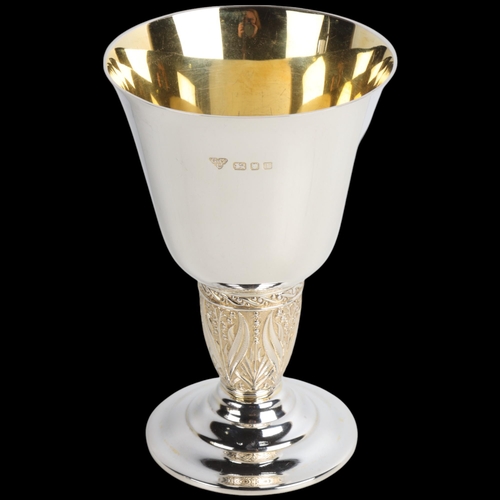 1960 - An Elizabeth II silver goblet, Garrard & Co Ltd, London 1954, with parcel-gilt snowdrop stem and gil... 