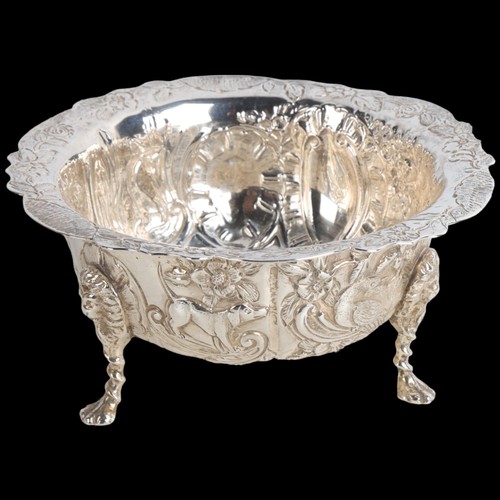 1964 - An Edwardian Irish silver bowl, Wakeley & Wheeler, Dublin 1902, allover relief embossed decoration, ... 