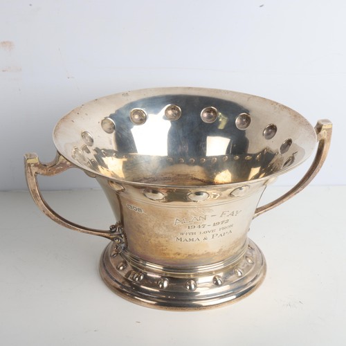 1965 - An Arts and Crafts Edwardian silver 2-handled table centre fruit bowl, Wakeley & Wheeler, London 190... 