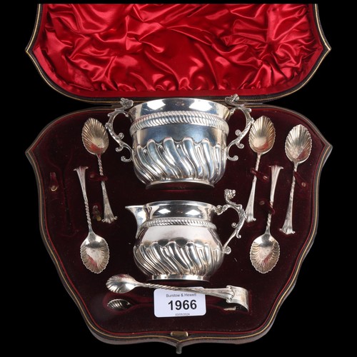 1966 - A cased late Victorian silver tea drinking set, Goldsmiths & Silversmiths Co Ltd, London 1893, inclu... 