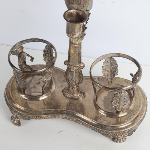 1967 - **WITHDRAWN** - A 19th century Continental silver Empire style oil and vinegar stand, with cherub ca... 