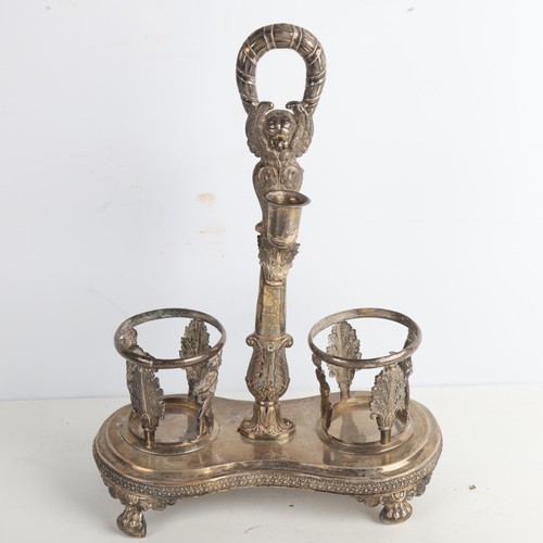 1967 - **WITHDRAWN** - A 19th century Continental silver Empire style oil and vinegar stand, with cherub ca... 