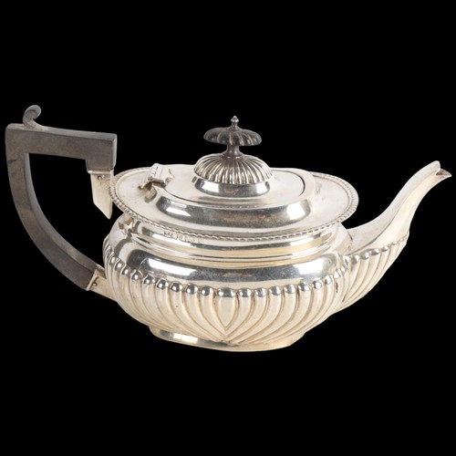 1968 - An Edwardian silver bachelor's teapot, William Aitken, Birmingham 1902, oval bulbous form with half ... 