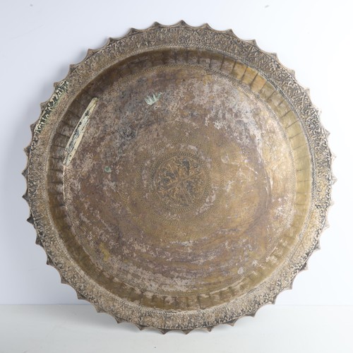 1970 - A large Malay silver platter tray, Malay Peninsular or Riau, 19th-early 20th century, with relief em... 