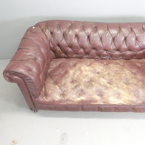 2635 - A Victorian buttonback studded leather upholstered Chesterfield style sofa. Overall 183x74x80cm, sea... 