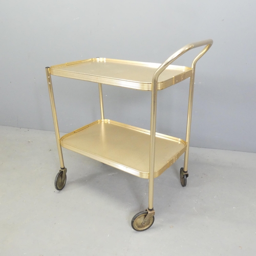 2639 - A mid-century style two-tier tea trolley, 64x76x37cm and a magazine / record rack, 57x44x44cm. (2)